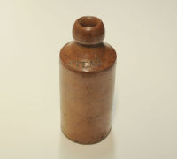 Stoneware beer or ginger beer bottle with the inscription 'ATLAS'. 