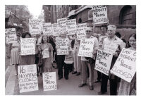 Photograph: Campaigners holding placards