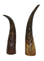 A pair of carved goat horns 